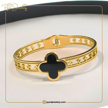 Pyari Jewellery Gold Cuff Bracelet with Black Clover Charm – Elegant Artificial Jewelry for Women