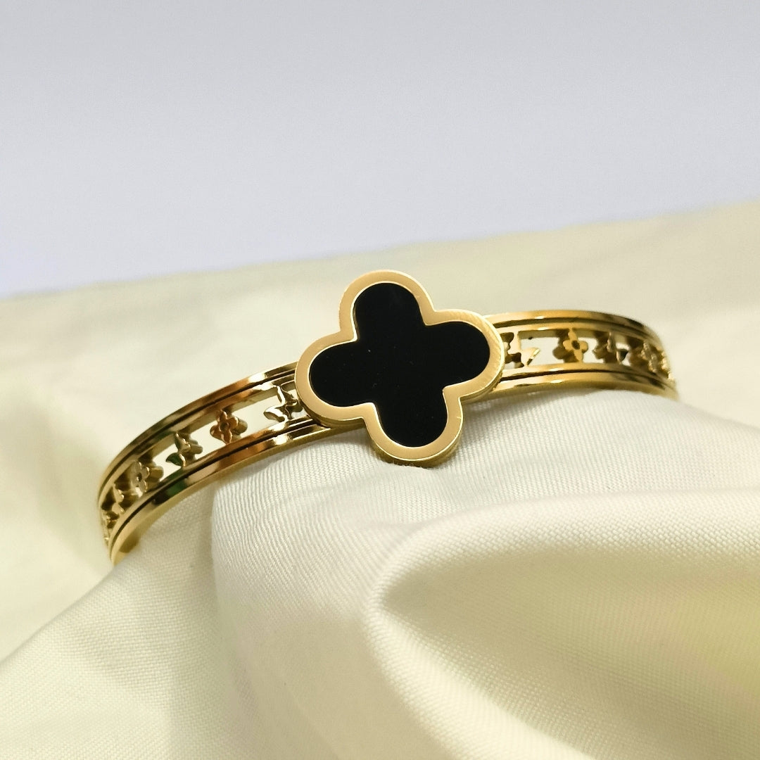 Pyari Jewellery Gold Cuff Bracelet with Black Clover Charm – Elegant Artificial Jewelry for Women